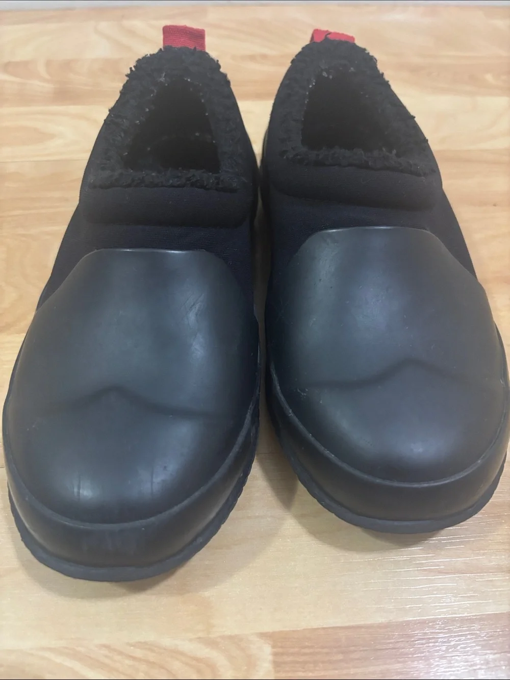 Hunter Kids Black Slip-On Rain Boots with Red Pull Tabs